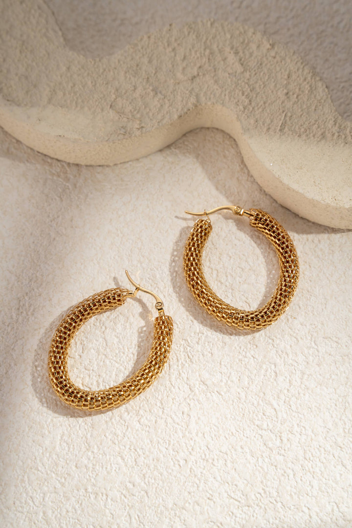 Boucles d’oreilles dorées acier inoxydable créoles tressées