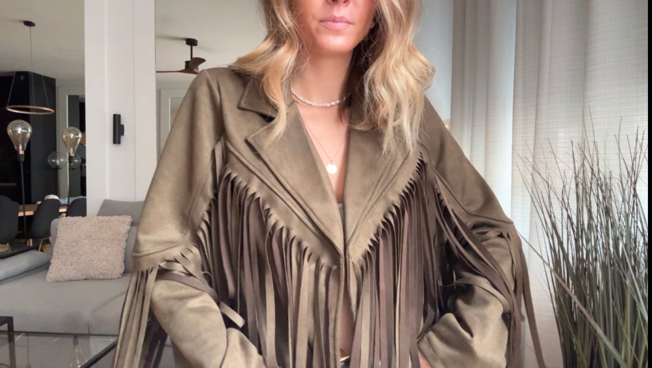 Veste en suédine avec des franges